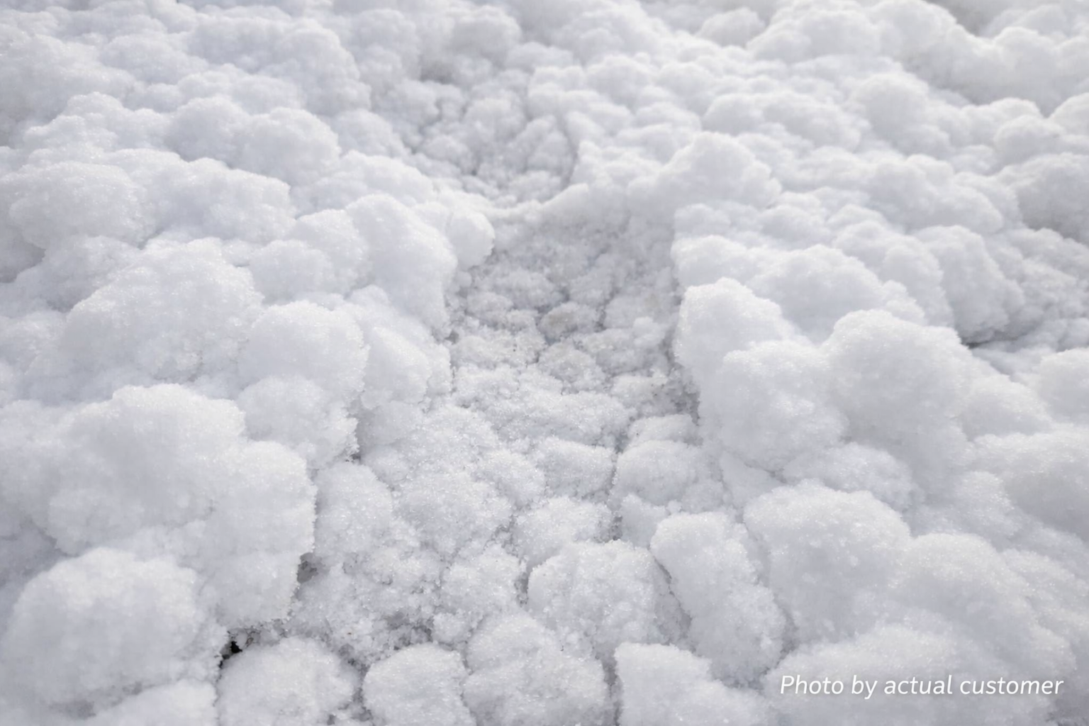 Close-up of fluffy machine-made snow crystals
